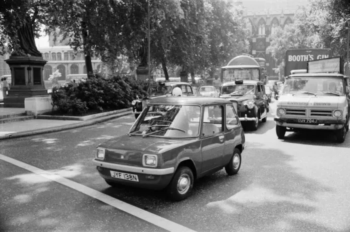 Framed Print : The Electric Car. A new unusually quiet little motor car can be seen going Framed Print : The Electric Car. A new unusually quiet little motor car can be seen going
