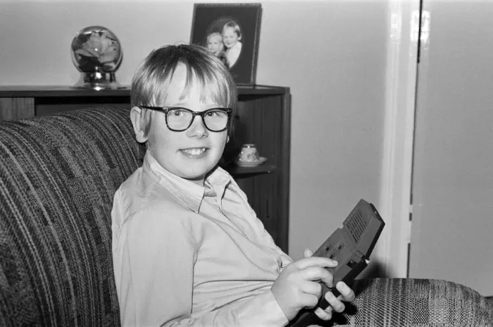Framed Print : Electronic childrens toys. Pictured, 12 year old Mark with the Merlin Electronic Framed Print : Electronic childrens toys. Pictured, 12 year old Mark with the Merlin Electronic