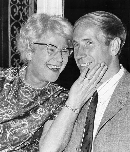 Elizabeth Charlton, affectionately known as Cissie, congratulates her son Bobby Charlton