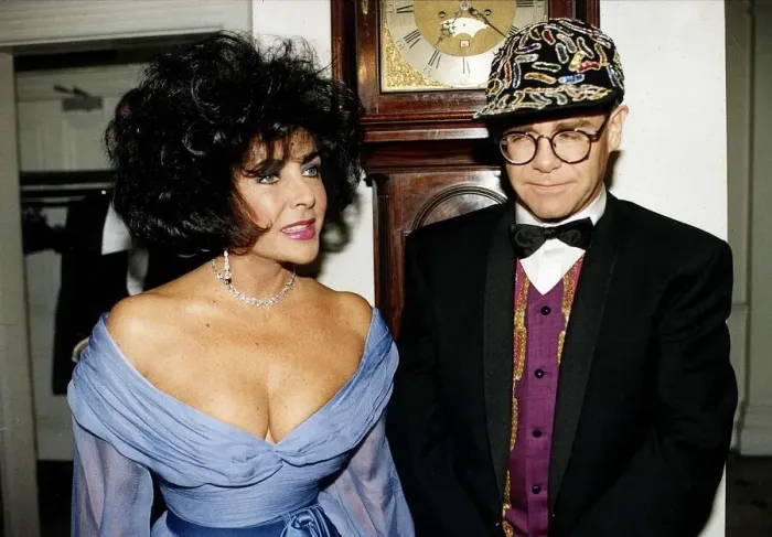 Framed Print : Elizabeth Taylor and Elton John together at a charity function for AIDS at Lodons Framed Print : Elizabeth Taylor and Elton John together at a charity function for AIDS at Lodons