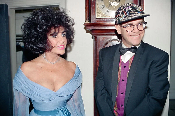 Elizabeth Taylor and Elton John at a gala dinner in aid of the AIDS Crisis Trust in