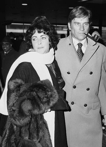 Elizabeth Taylor and husband John Warner seen here at Heathrow Airport before departing