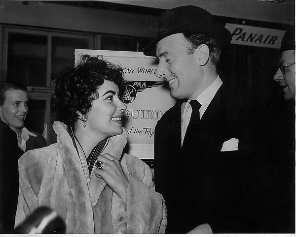 Elizabeth Taylor and husband Michael Wilding at London airport February 1952