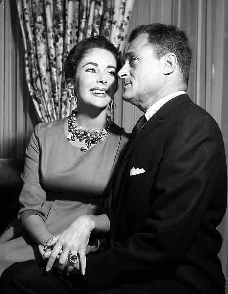 Elizabeth Taylor with Husband Mike Todd showing off her diamond ring