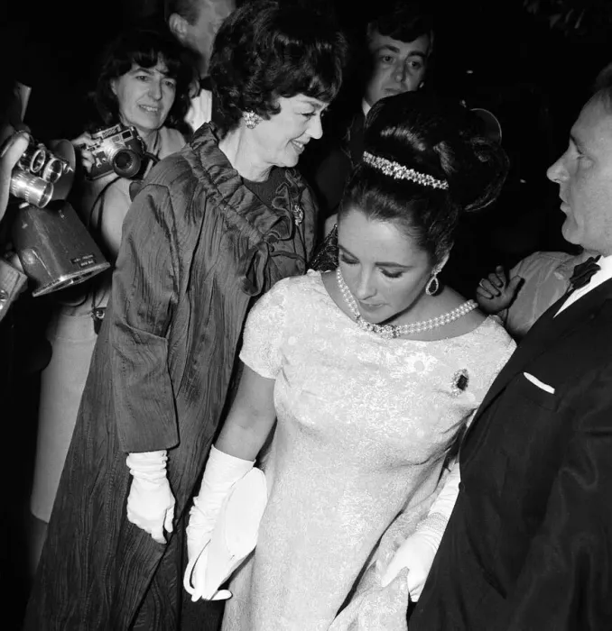 Framed Print : Elizabeth Taylor November 1965 and husband Richard Burton at Hollywood Party
