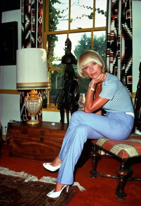 Framed Print : Elke Sommer, actress inside a house sitting on a chair sex icon