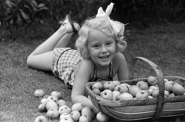 Ella Edwards with a fruit basket. October 1941