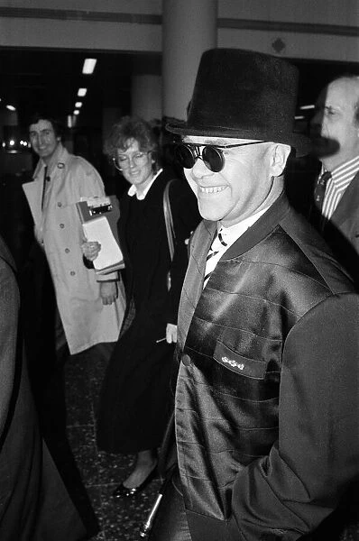 Elton John attending an event. March 1987