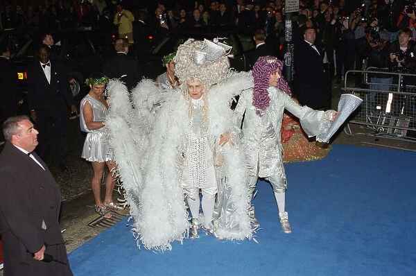 Elton John and David Furnish arriving at Eltons 50th birthday party at Hammersmith