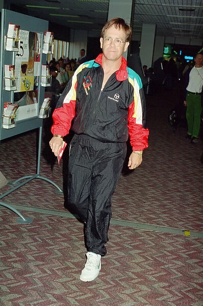 Elton John at Heathrow Airport. 19th September 1993