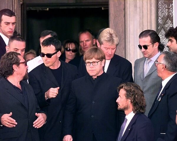 Elton John leaves Gianni Versace memorial service July 1997 with boyfriend David