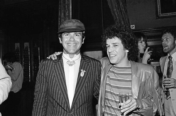 Elton John and Leo Sayer attending a House of Commons reception