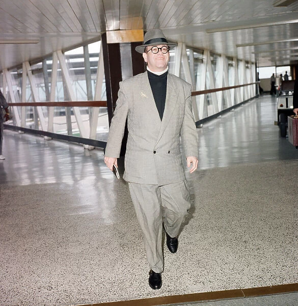 Elton John at London Airport. 29th July 1988