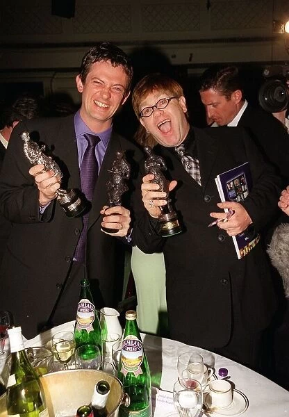 Elton John and Mirror writer Matthew Wright May 1998 At the Ivor Novello Awards