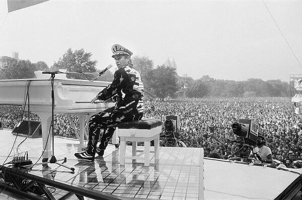 Elton John performing in Central Park, New York, America