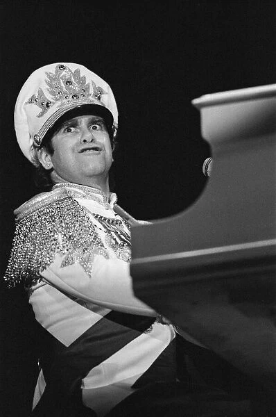 Elton John performing in concert during his 'Jump Up Tour'. 5th December 1982