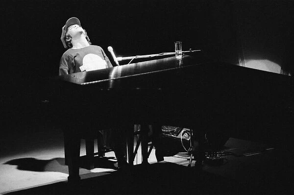 Elton John performing in concert at the Theatre des Champs-Elysees, Paris