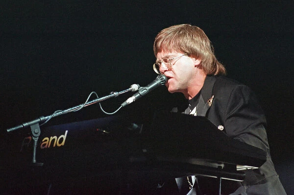 Elton John performing at the National Indoor Arena, Birmingham during The One Tour
