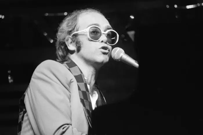 Framed Print : Elton John performing on stage, during the Elton John and Ray Cooper concert tours