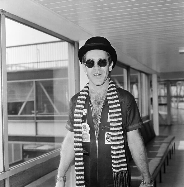 Elton John pictured on his arrival from a recording session in Los Angeles