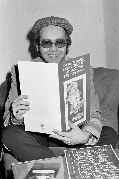 Elton John pictures on 24th March 1977, a day before his 30th birthday