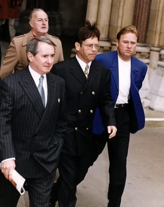 Framed Print : Elton John singer leaves the High Court during the libel court case against The Sunday Framed Print : Elton John singer leaves the High Court during the libel court case against The Sunday