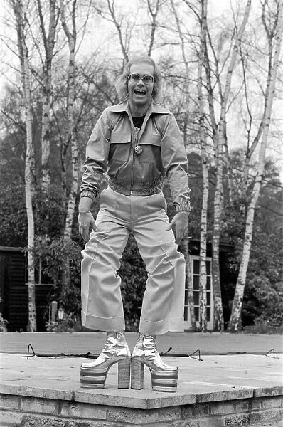 Elton John, singer, pictured at home in Virginia Water, in 1973