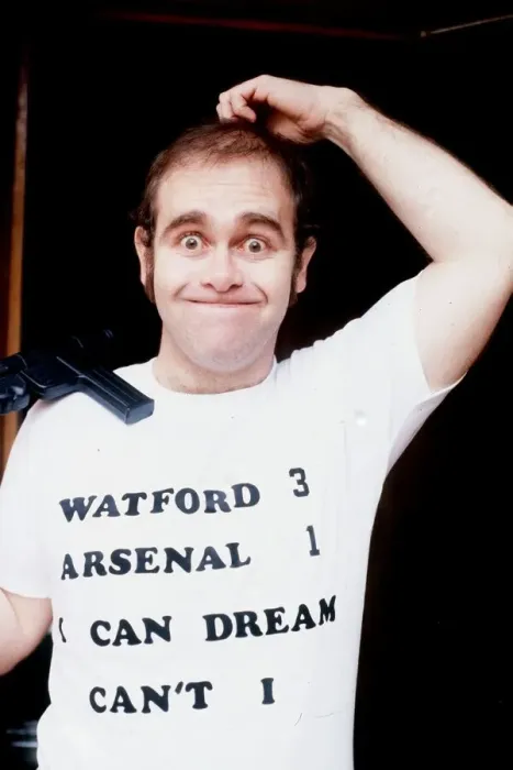 Framed Print : Elton John singer scratching head Watfor 3 Arsenal 1 t shirt I can dream can t I