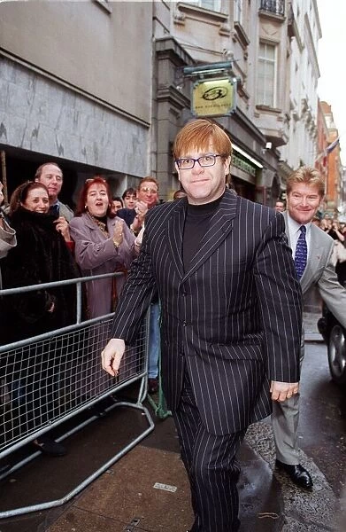 Elton John Singer  /  Songwriter attending the sale of his old cloths with the profits going