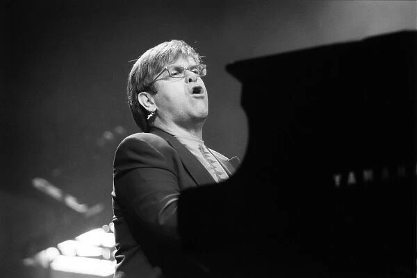 Elton John, singer and songwriter, performing at The Newcastle Arena, Tyne and Wear