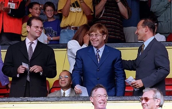 Elton John singer and Watford FC Chairman receiving a standing ovation at Vicarage Road
