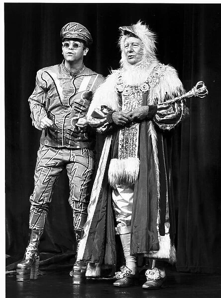 Elton John with Sir John Gielgud at a charity show in London