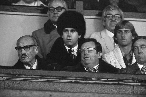 Elton John watching the Watford v Gillingham football match. 11th November 1978