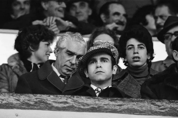 Framed Print : Elton John watching the West Ham United v Watford football match. 7th January 1978 Framed Print : Elton John watching the West Ham United v Watford football match. 7th January 1978