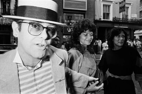 Elton John and his wife Renate arrive at the Comedy Theatre. 14th June 1984