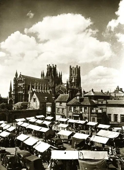 Framed Print : Ely Cathedral Cambridgeshire over looking the town square on a market day Framed Print : Ely Cathedral Cambridgeshire over looking the town square on a market day