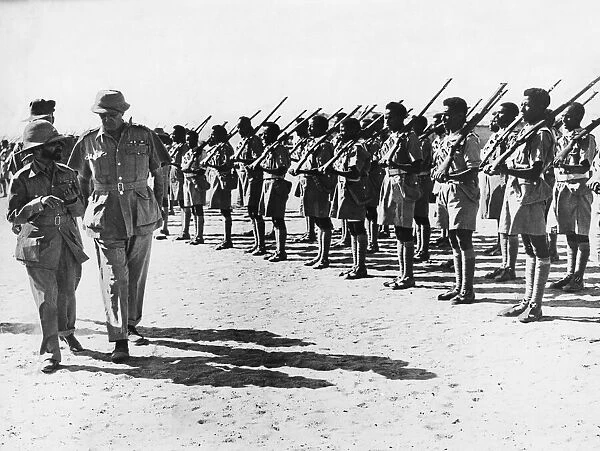 The Emperor of Abysinnia, Haile Selassie, inspects a battalion before they depart