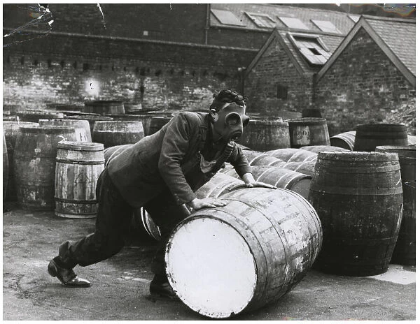 An employee of Blundell Spence, paint manufacturers, in Hull is seen here at work wearing