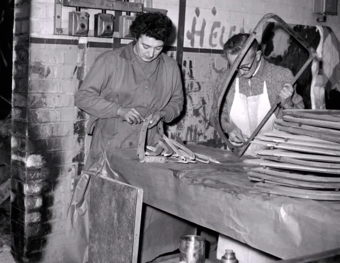 Framed Print : These employees are working on some of the 31 wood fixtures which go into a jaguar Framed Print : These employees are working on some of the 31 wood fixtures which go into a jaguar