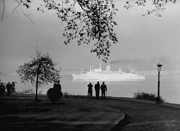 The Empress of Canada seen here steaming along the River Mersey on her maiden voyage