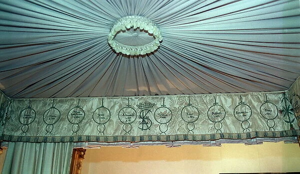 Emroidered drapes above the four - Poster bed where the Queen Mother was born in Glamis