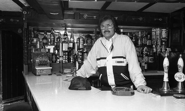 Engelbert Humperdink behind the bar of his own pub at his home near Leicester