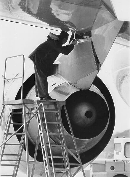 The engine of a McDonnell Douglas DC-10 airliner  /  aircraft being examined at Gatwick