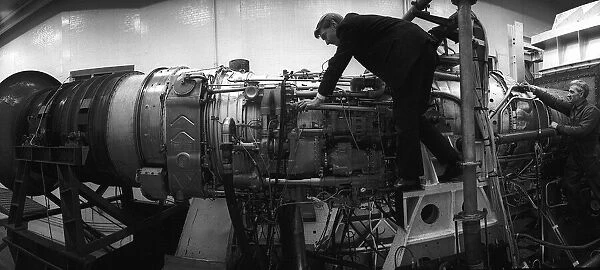 Engineers at the Bristol Siddeley factory working on the Rolls Royce Olympus engine