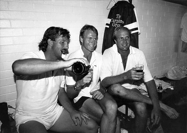 England all rounder Ian Botham celebrates in the dressing room with teammates in