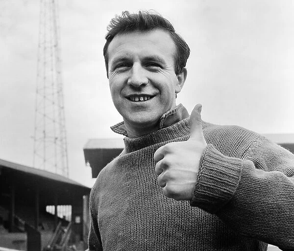 England captain Jimmy Armfield gives the thumbs up during a private training session at Blackpool FC home ground Bloomfield Road as he fights to be fit for the England tour party heading off to America later in the month. 13th May 1964