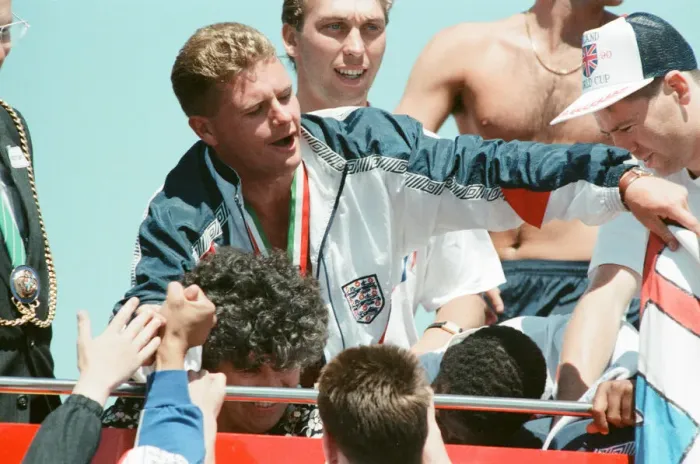 Framed Print : The England football team arrive at Luton airport after returning from the World Cup