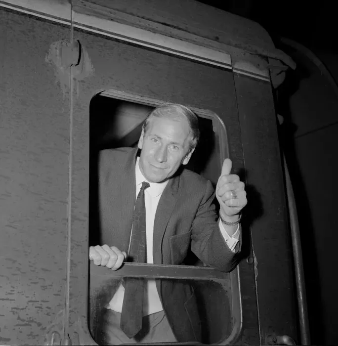 Framed Print : England footballer Bobby Charlton gives the thumbs up gesture as he leans out of