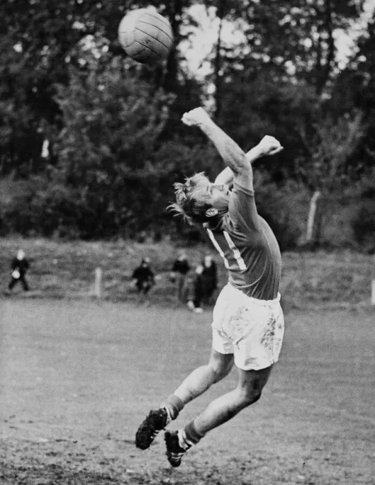 Framed Print : England footballer Bobby Charlton takes a turn in goal during a training session Framed Print : England footballer Bobby Charlton takes a turn in goal during a training session