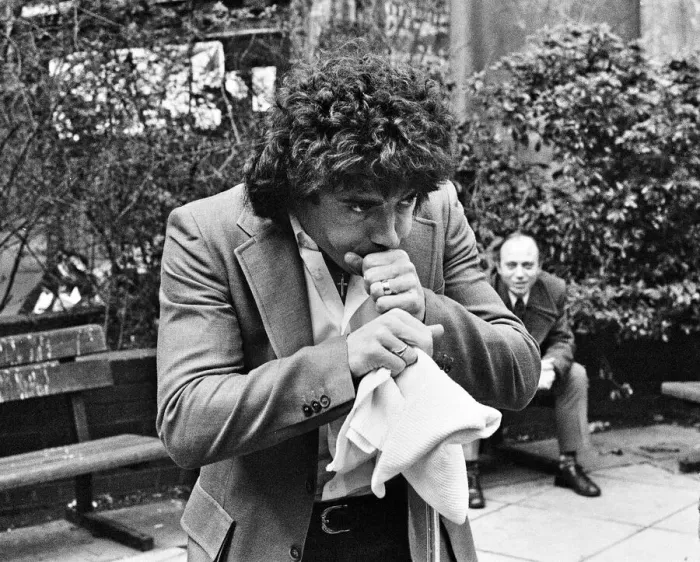 Framed Print : England footballer Kevin Keegan poses for photographers as he performs a joke for them Framed Print : England footballer Kevin Keegan poses for photographers as he performs a joke for them